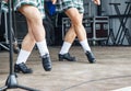 Female legs of three irish dancers