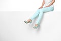 female legs in turquoise trousers and high heels shoes Royalty Free Stock Photo