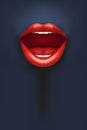 Female lips on dark background