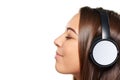 Female listening enjoying music in headphones with closed eyes Royalty Free Stock Photo