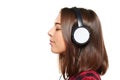 Female listening enjoying music in headphones with closed eyes Royalty Free Stock Photo