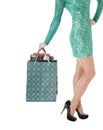 Female long legs in black shoes and shopping gift bags. Royalty Free Stock Photo