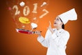 Female magician chef with numbers 2017 Royalty Free Stock Photo