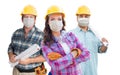 Female and Male Contractors In Hard Hats Wearing Medical Face Masks During Coronavirus Pandemic Isolated on White Royalty Free Stock Photo