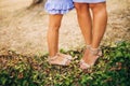 Female and male feet on grass Royalty Free Stock Photo