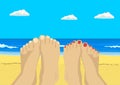 Female and male feet on tropical beach