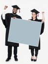 Female and male grad holding a copy space Royalty Free Stock Photo