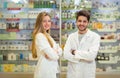 Female and male pharmacists