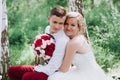 Female and male portrait. Lady and guy outdoors.Wedding couple in love, close-up portrait of young and happy bride and groom at we Royalty Free Stock Photo