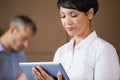 Female manager using digital tablet in warehouse Royalty Free Stock Photo