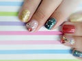 Female manicure. Steep and very stylish design of manicure. Colorful nails