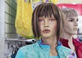 Female mannequin in a clothing store. Trading equipment - female plastic dummy