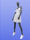 Female mannequin dressed in white stripped dress.