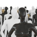 Female mannequin waist-high against a background of a group of black and white mannequins. 3D rendering Royalty Free Stock Photo