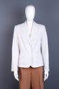 Female mannequin in white striped blazer. Royalty Free Stock Photo