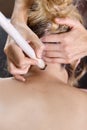 A female massage therapist doing a massage Royalty Free Stock Photo