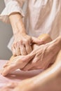 A female massage therapist doing a massage Royalty Free Stock Photo