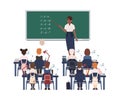 Female math teacher explaining summation to elementary school kids or pupils. Smiling african american woman teaching Royalty Free Stock Photo