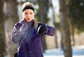 Female measures pulse on training Royalty Free Stock Photo