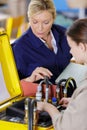 Female mechanic in electronics training course