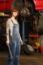 Female mechanic with tattoos