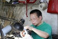 Female mechanic working carefully Royalty Free Stock Photo