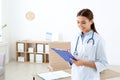 Female medical assistant working in clinic Royalty Free Stock Photo