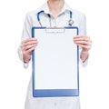 Female medical doctor holding clipboard