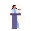 Female medical doctor standing at podium and giving a speech at a medicine conference. Presentation scientific research