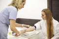 Nurse preparing patient for blood draw Royalty Free Stock Photo