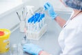 Female medical or scientific laboratory researcher performs tests. Close up, selective focus Royalty Free Stock Photo
