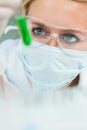 Female Scientist With Green Test Tube In Laboratory Royalty Free Stock Photo