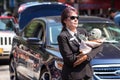 Female Men In Black Agent Carries Alien Baby In Parade