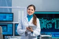 Female microelectronics engineer works in a scientific laboratory on computing systems and microprocessors. Professional