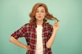 female model in checkered shirt. pretty look of young smiling girl. red haired woman. Royalty Free Stock Photo