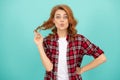 female model in checkered shirt. pretty look of young smiling girl. red haired woman. Royalty Free Stock Photo