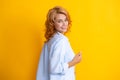 Female model face. Redhead woman. Carefree redhead woman smiles cheerfully isolated on yellow background in good mood. Royalty Free Stock Photo