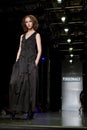 Female model at a fashion show by Persomage Collec