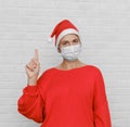 Female model wearing a Santa hat Royalty Free Stock Photo