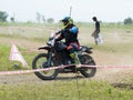 Female Motocross Racer on her motorcycle