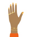 Female mulatto hand with a ring and bracelet. Orange manicure