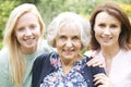 Female Multi Generation Portrait In Garden