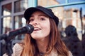 Female Musician Busking Singing Outdoors In Street Royalty Free Stock Photo