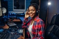 Female musician in headphones in recording studio Royalty Free Stock Photo