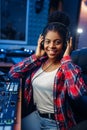 Female musician in headphones in recording studio Royalty Free Stock Photo