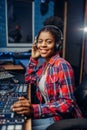 Female musician in headphones in recording studio Royalty Free Stock Photo