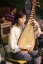 The female musician pipa accompaniment Royalty Free Stock Photo