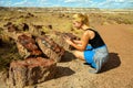 Female national park visitor admiring the view in Petrified Forest National Park, Arizona, USA Royalty Free Stock Photo