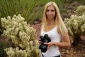 Female nature photographer taking photos of the saguaro cactus Carnegiea gigantea in Saguaro National Park, Arizona Royalty Free Stock Photo