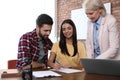 Female notary working with young couple Royalty Free Stock Photo